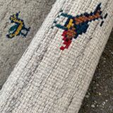Persian Gabbeh rug with playful patterns 240x170