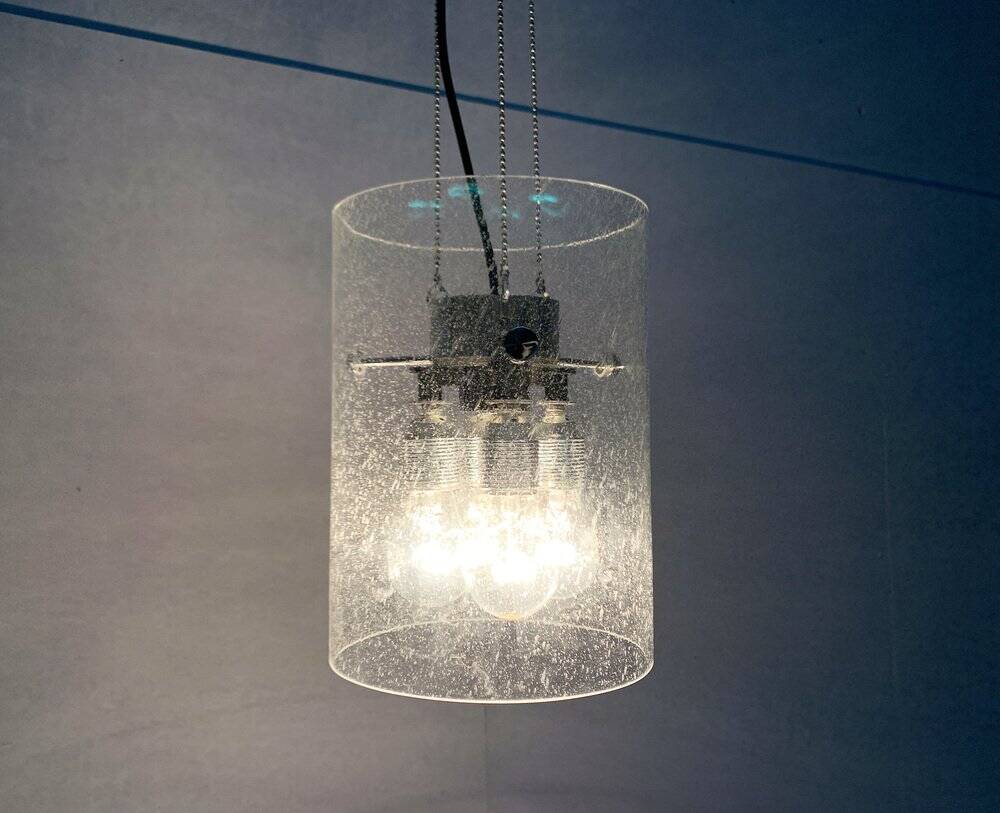 Glass and metal pendant lamp from the German space age by Glashütte Limburg, 1960s.