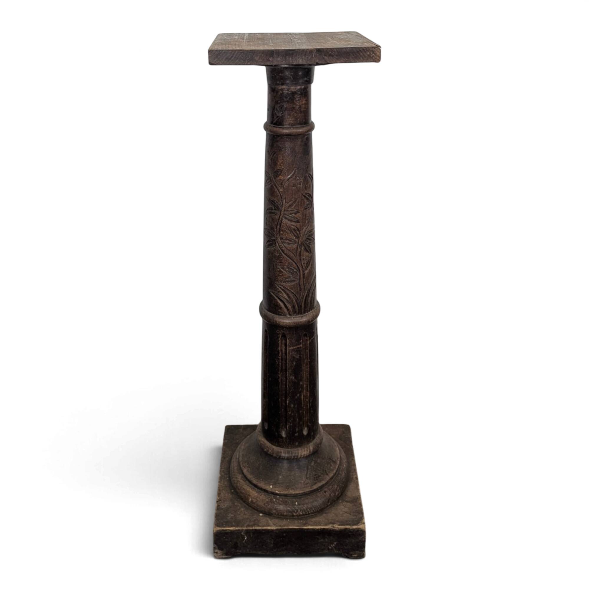 Fluted column side table in oak with a square top.