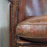 Cognac-colored sheepskin leather club chair