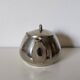 vintage teapot covered with silver metal
