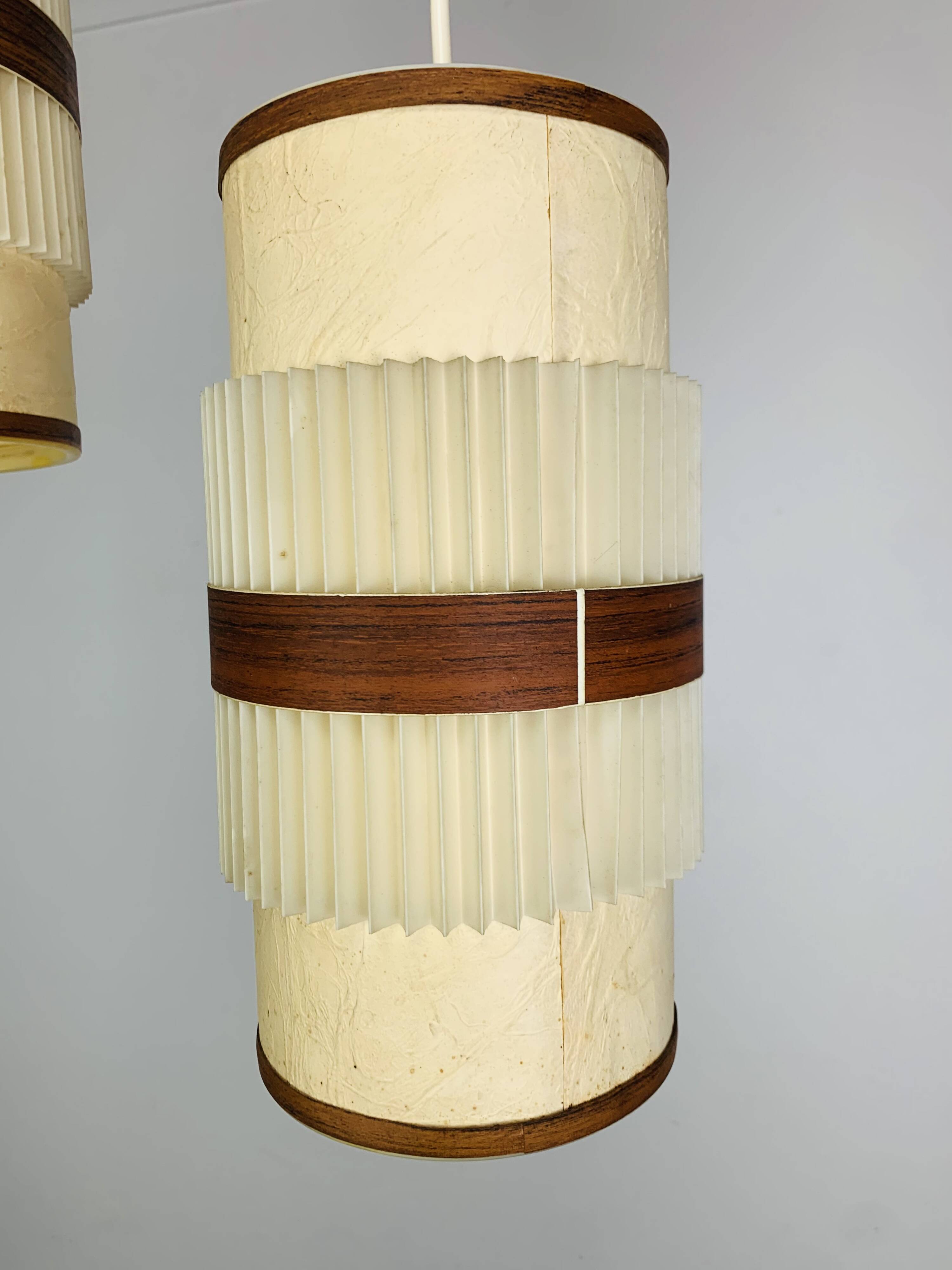 Pair of roller suspensions from the 70s, paper