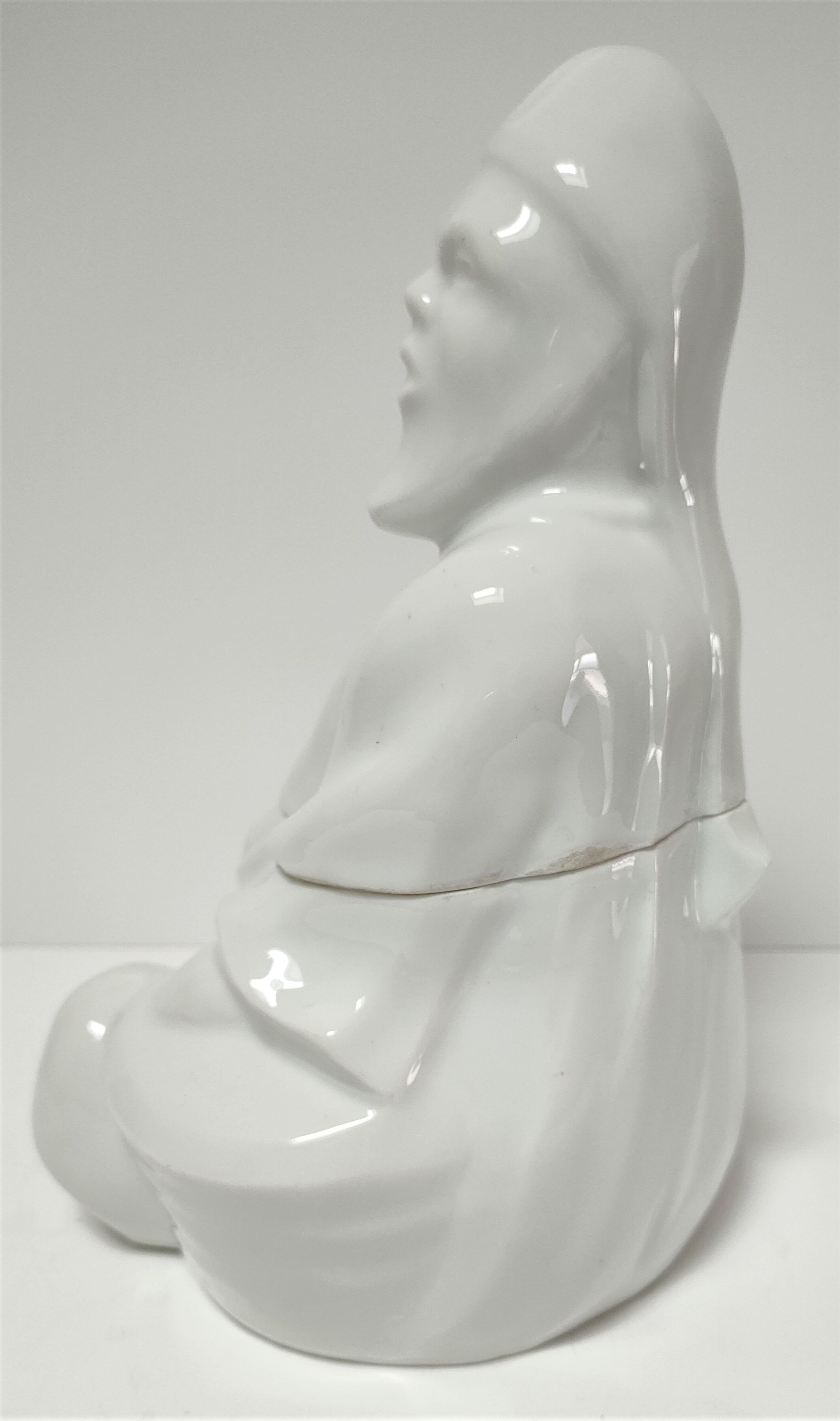 Anthropomorphic porcelain pot signed Baylac late nineteenth early twentieth