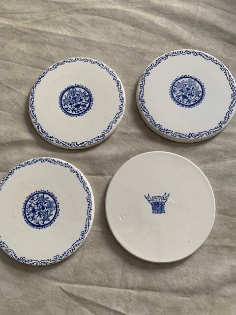 4 Rouen 1932 model bottle coasters in earthenware