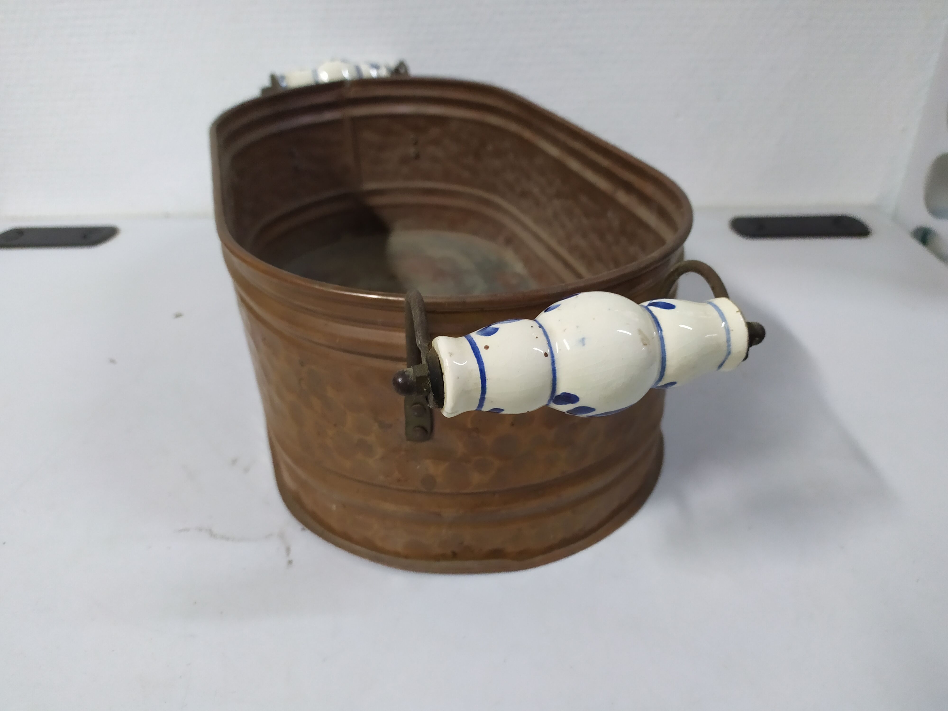 Copper planter with porcelain handles