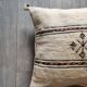 Off-white Berber cushion with wool pompom