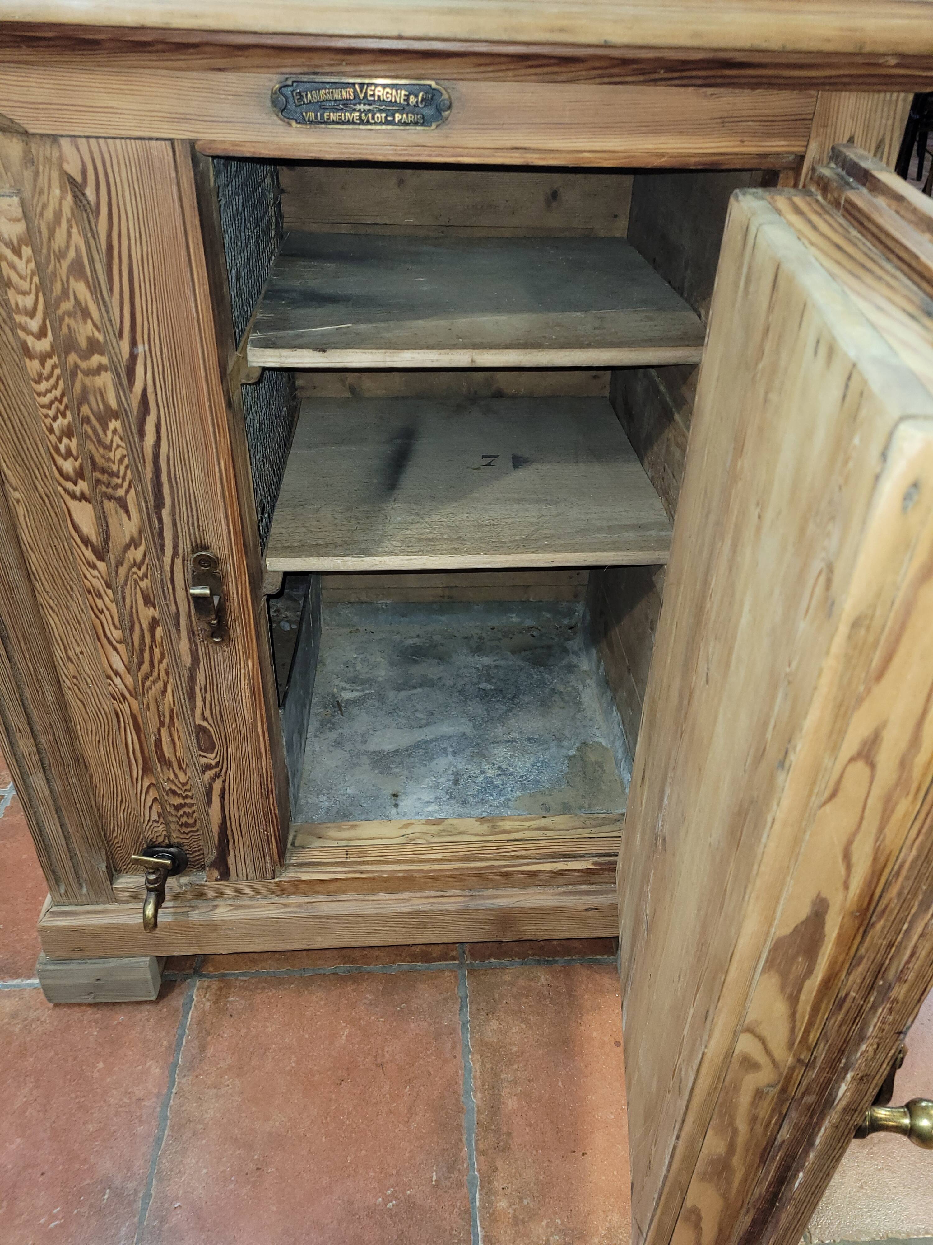 Antique cooler with a door