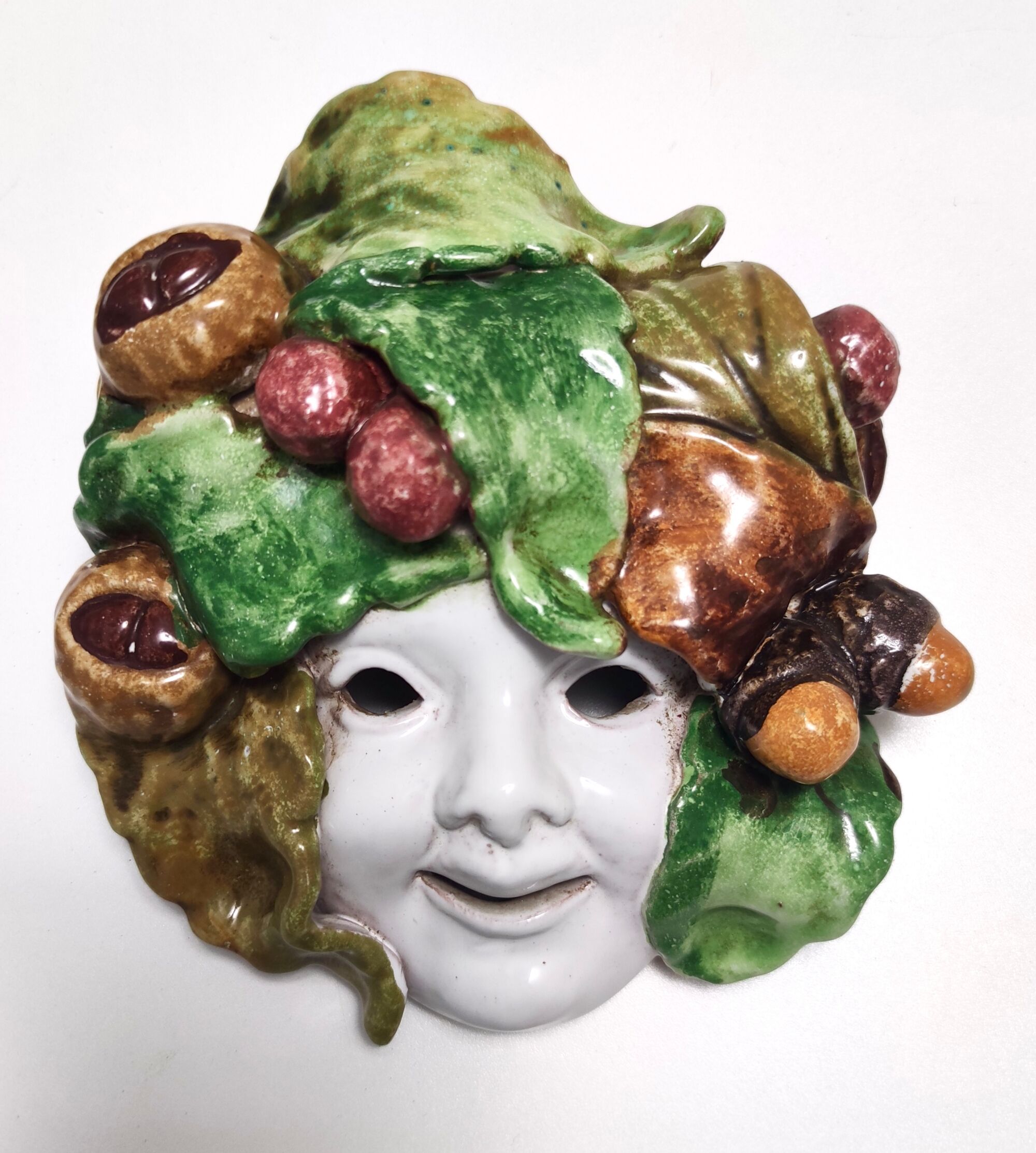 Vintage earthware commedia mask, florence