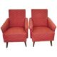 Pair of Mid-Century armchairs in red and brown fabric with dark wooden legs.