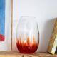Vintage blown glass vase with a speckled red design
