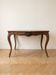 Louis XV coffee table in carved solid wood.