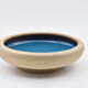 Blue enamelled sandstone cup