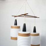 Scandinavian triangle pendant light in cascade with 3 opalines