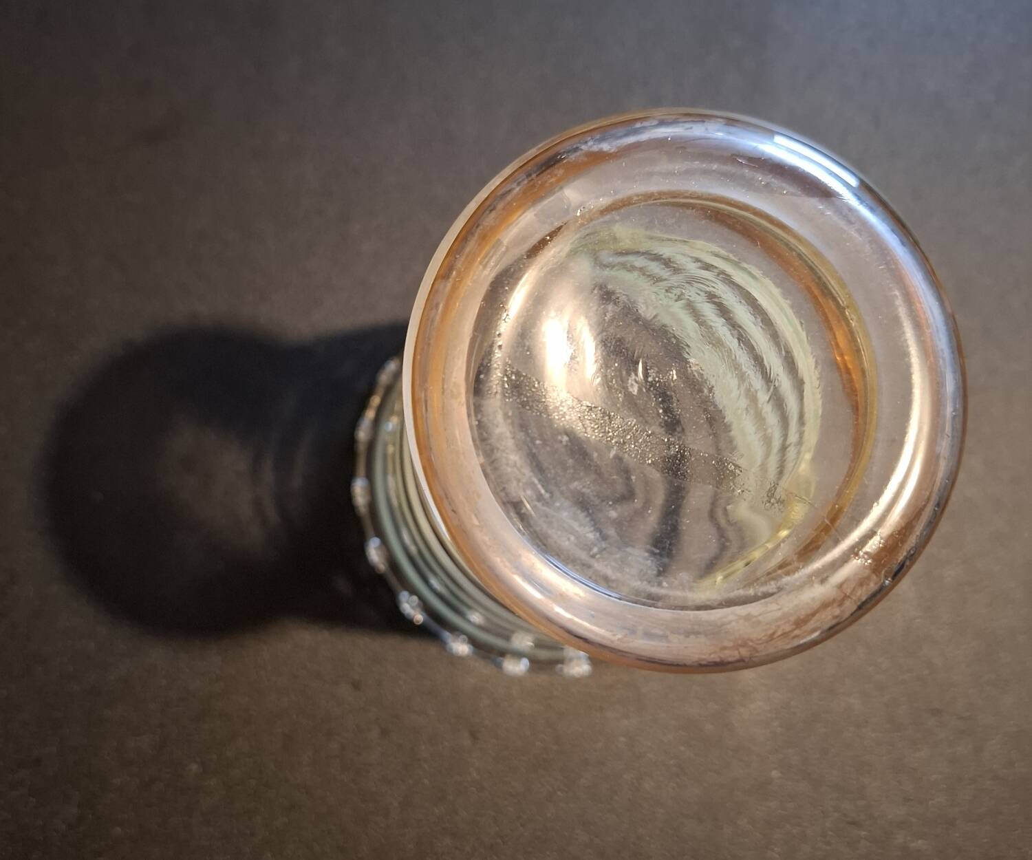 Vintage vase with green and gold trim.