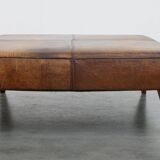 Hocker/coffee table made of sheepskin