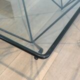 Black lacquered metal coffee table with a clear glass top. Attributed to Paolo Piva.