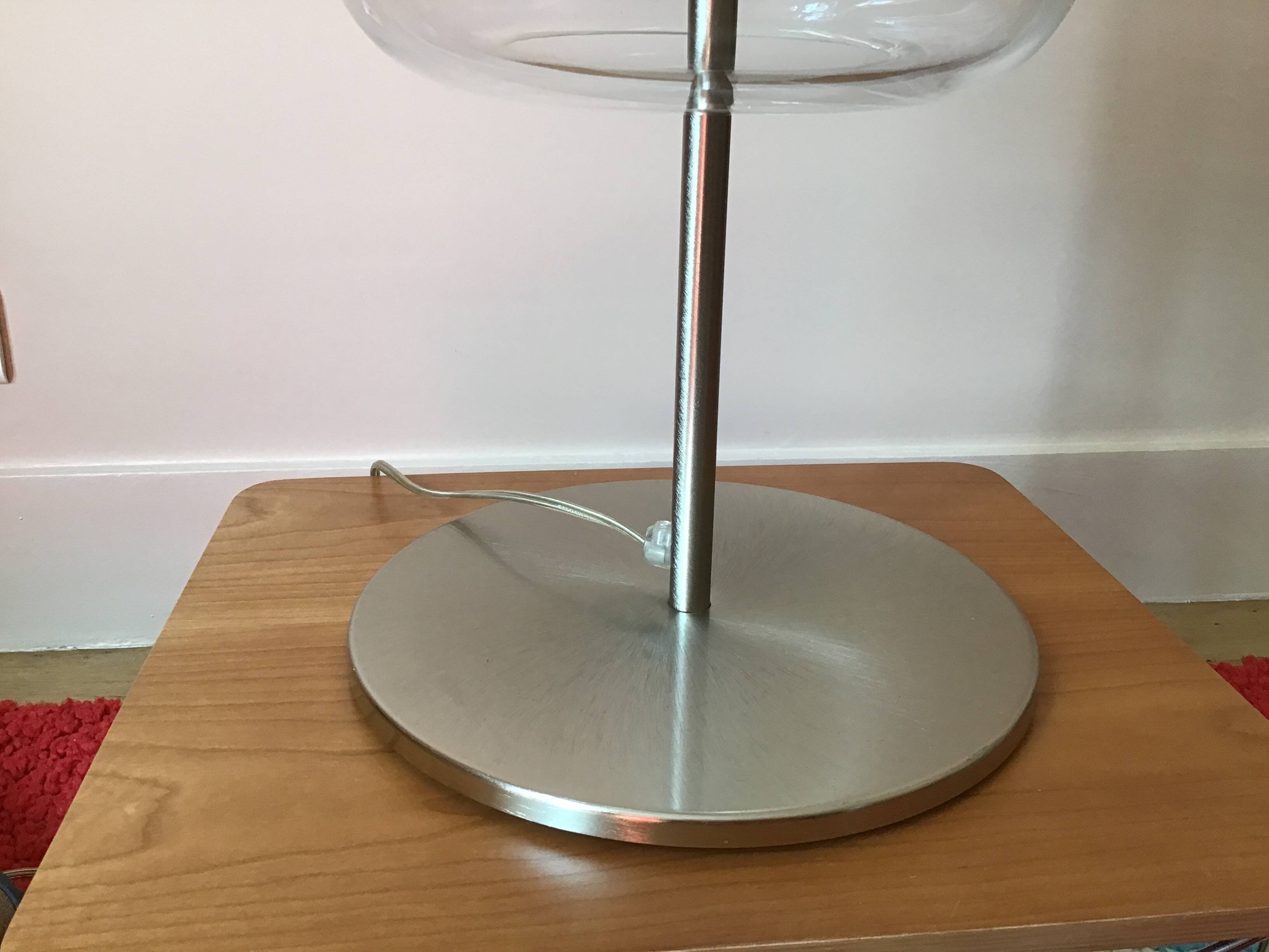 Table lamp in transparent glass and frosted glass.