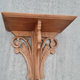 Openwork wooden wall shelf