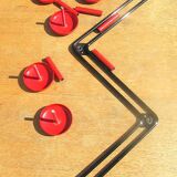 vintage black and red iron coat rack