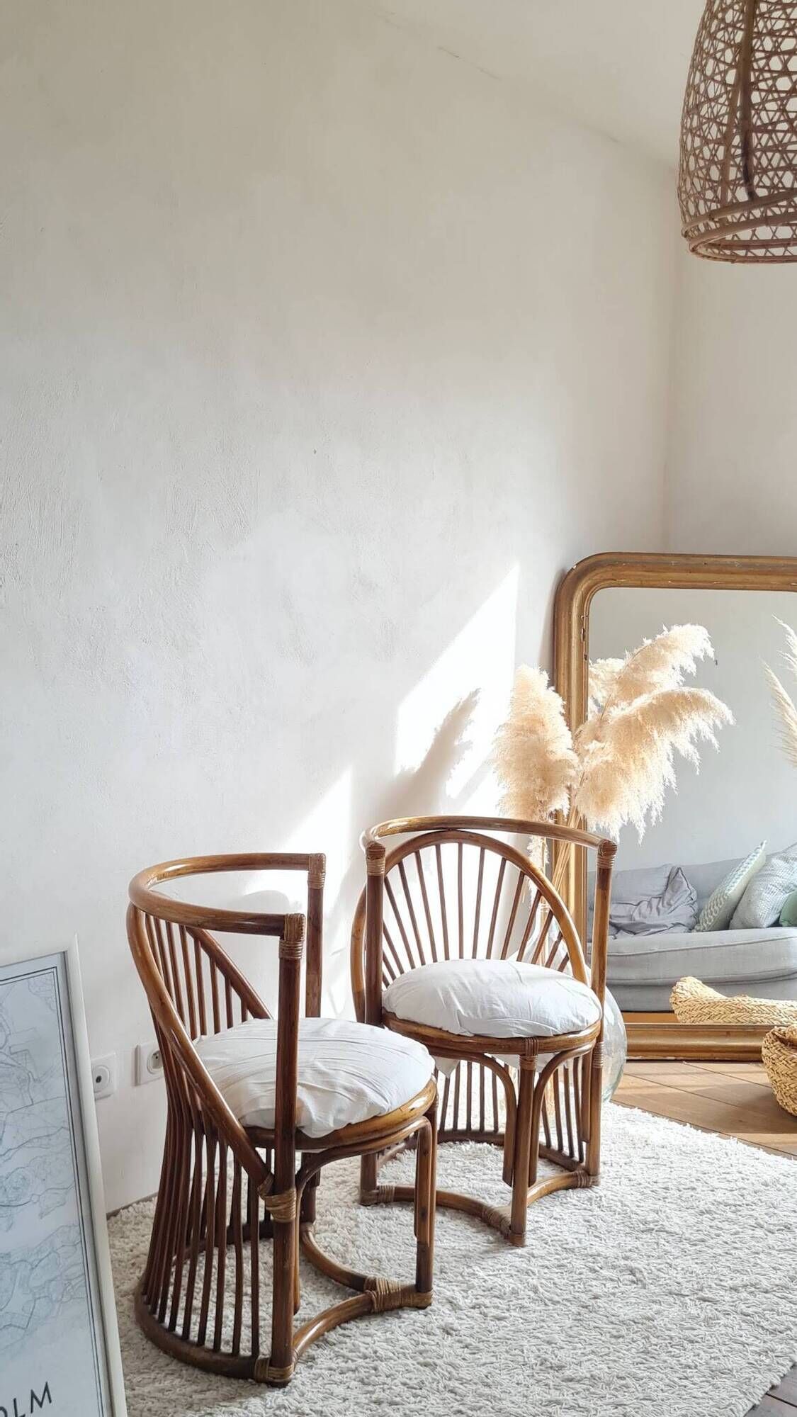 Pair of vintage rattan armchairs circa the 1960s.