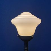 Standing copper table lamp with glass shade