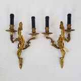 Pair of Louis XV style bronze wall lamps
