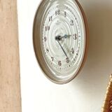 Clock in the shape of a round plate Junghans