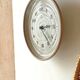 Clock in the shape of a round plate Junghans