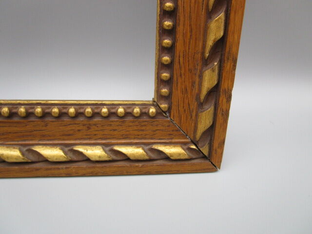 Old frame in worked/gilded oak