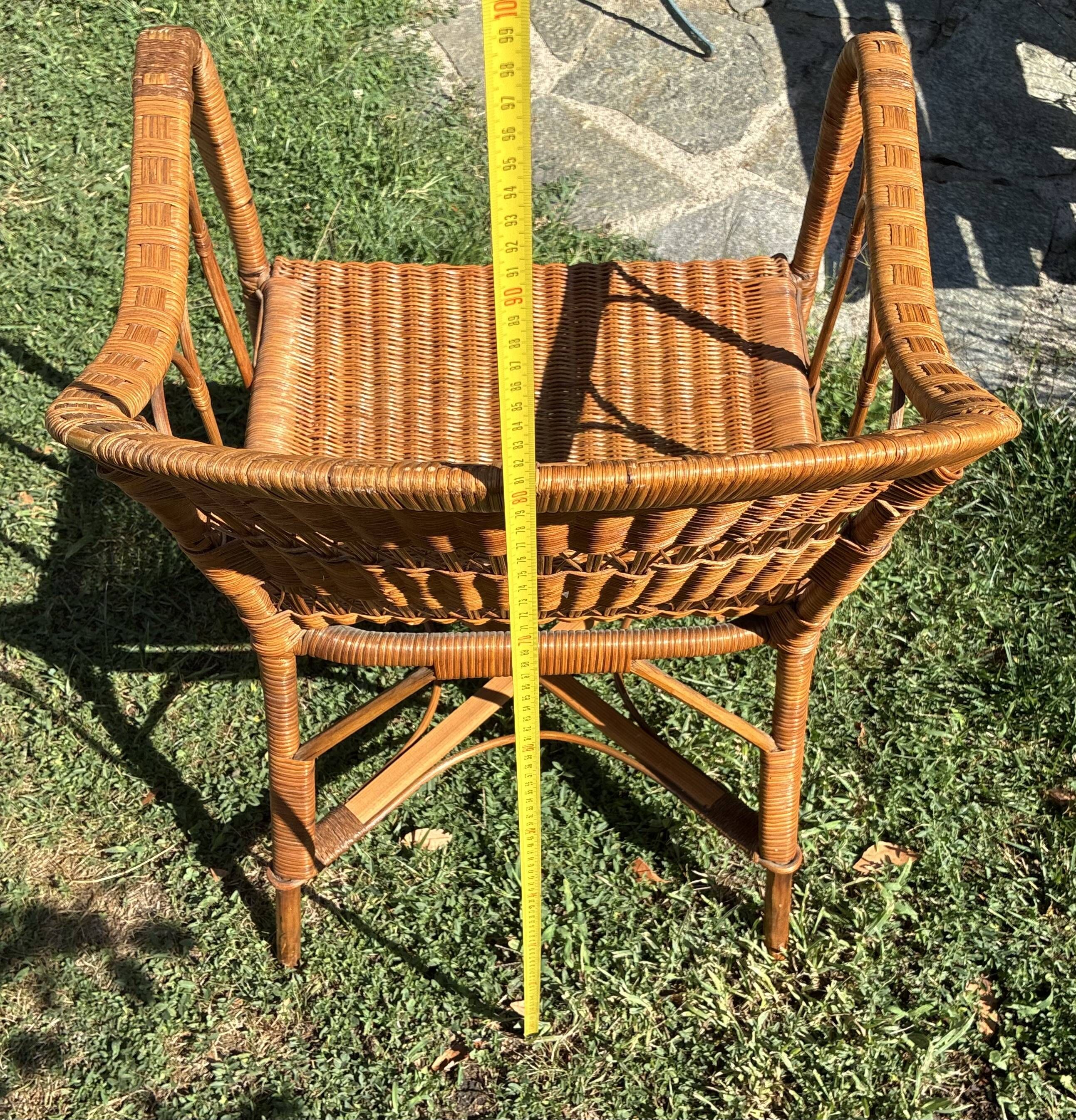Vintage colonial lounge chair in rattan, pre-1950s.