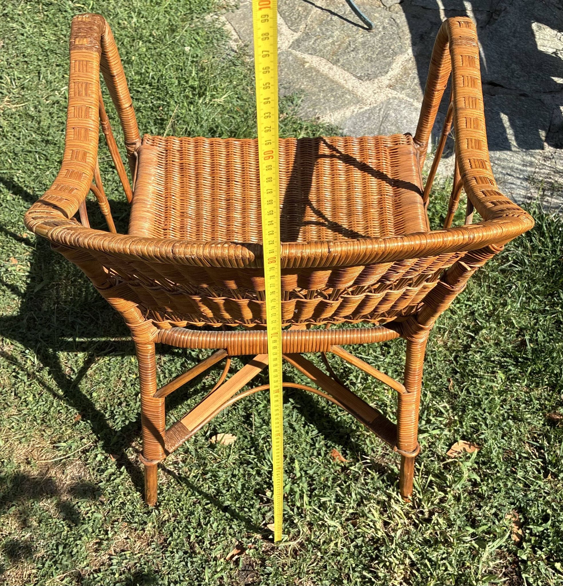 Vintage colonial lounge chair in rattan, pre-1950s.