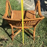 Vintage colonial lounge chair in rattan, pre-1950s.