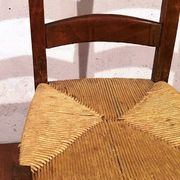 Vintage children's chair in wood and straw