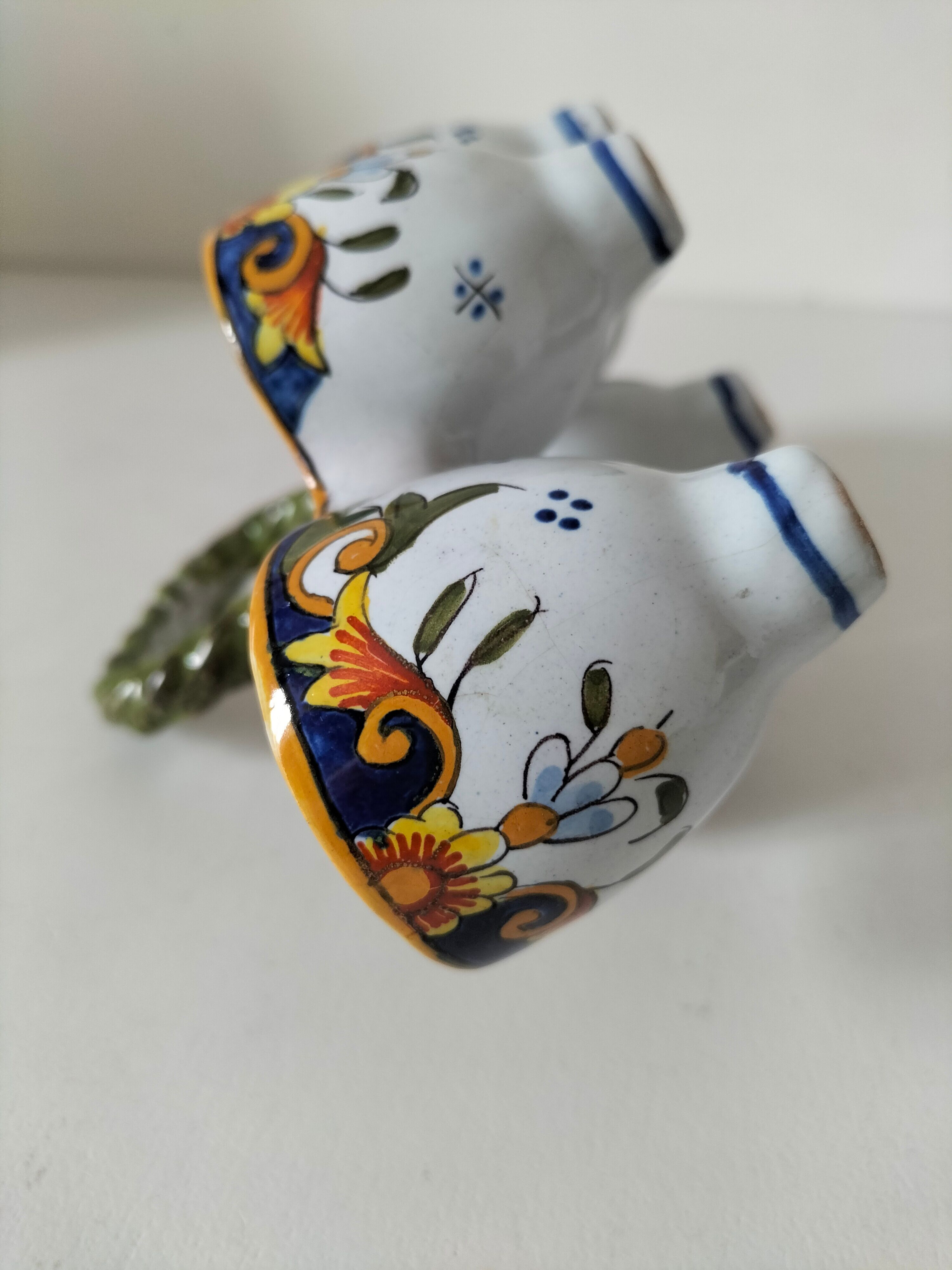 Antique egg holder by Jules Verlingue with polychrome floral decoration.