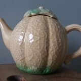 Teapot coffee maker pitcher melon in slippery water