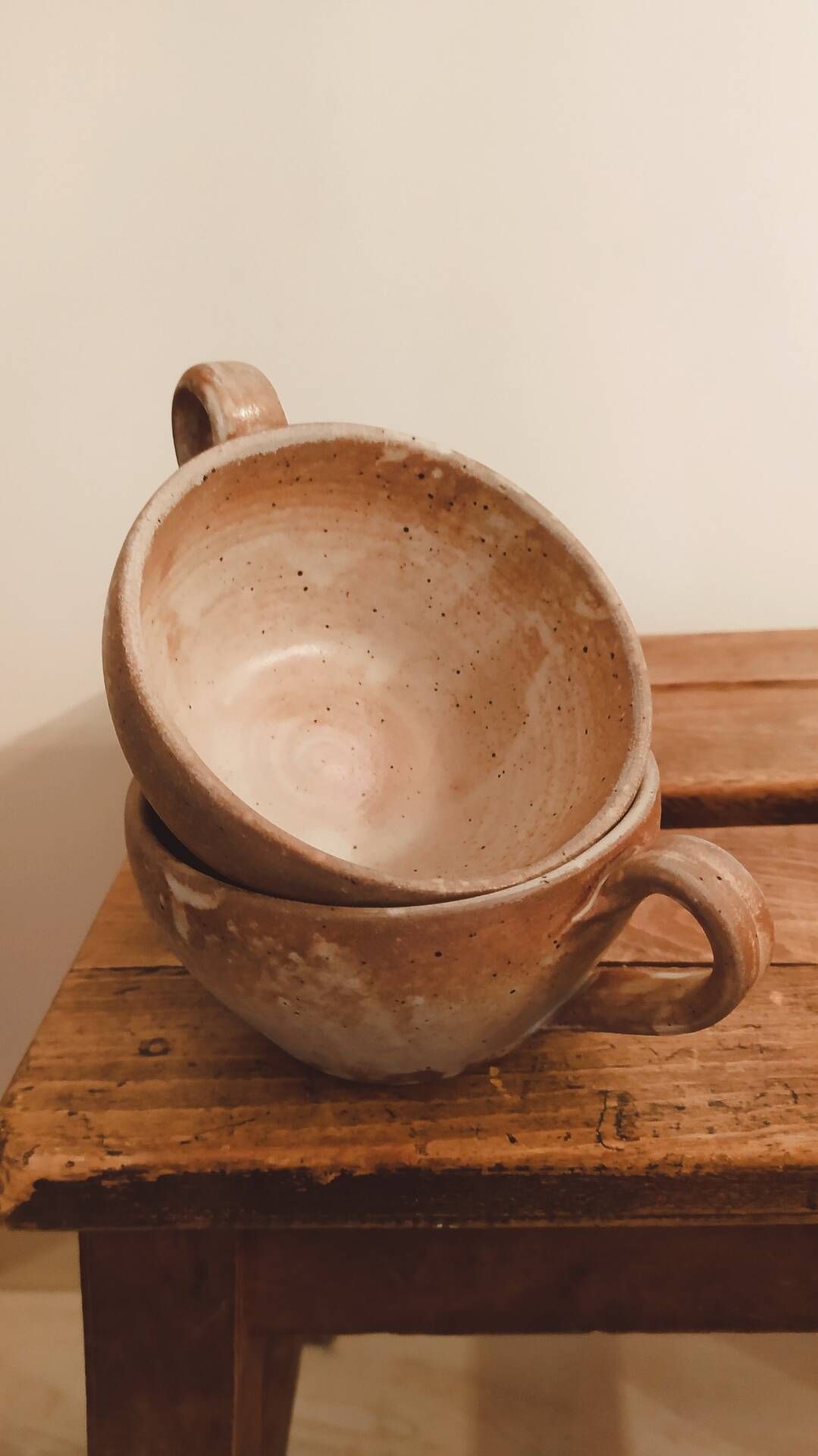 Pair of antique stoneware cups