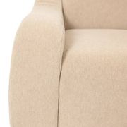 A pair of large and comfortable beige fabric armchairs. Contemporary.