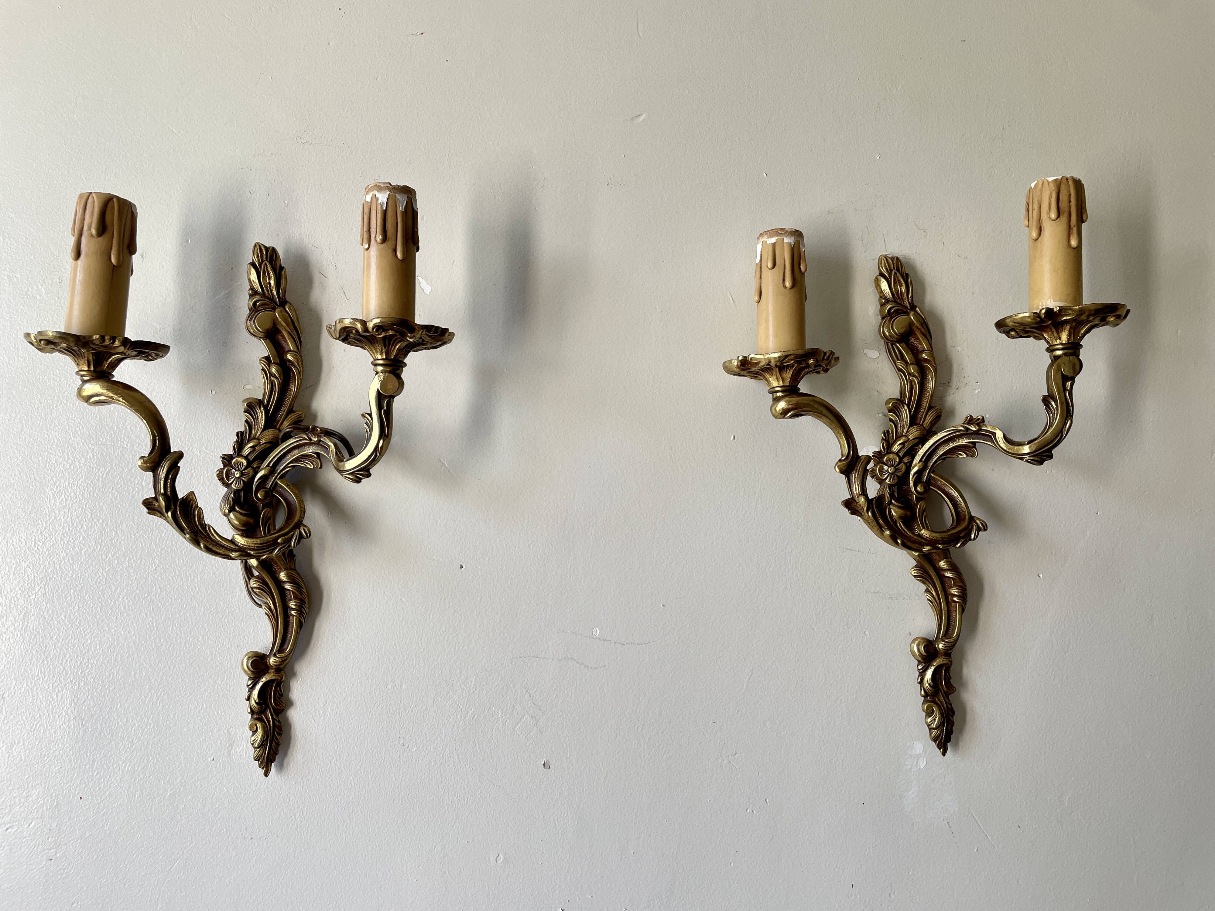 Pair of rocaille bronze wall sconces