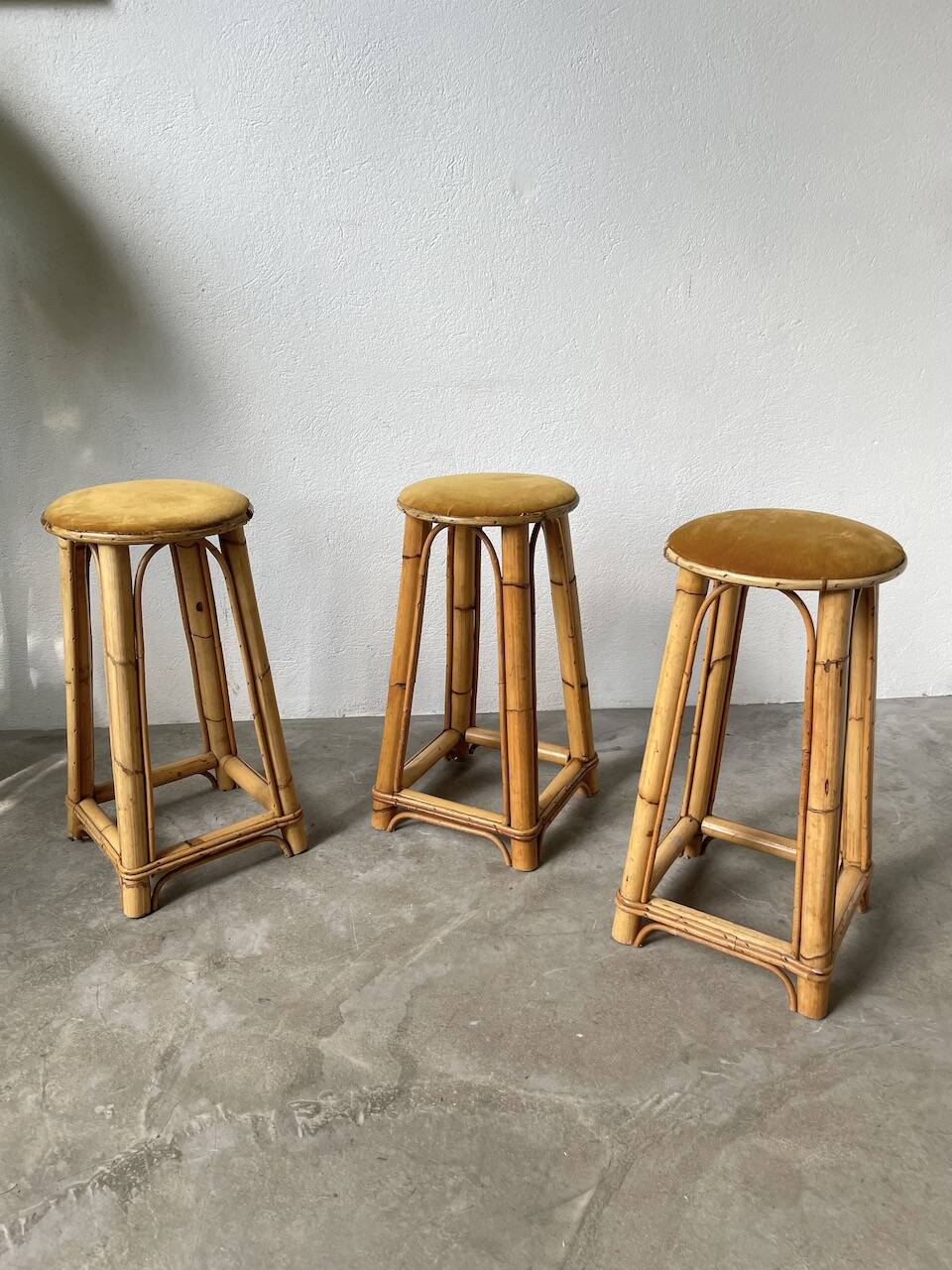 Set of three rattan high stools