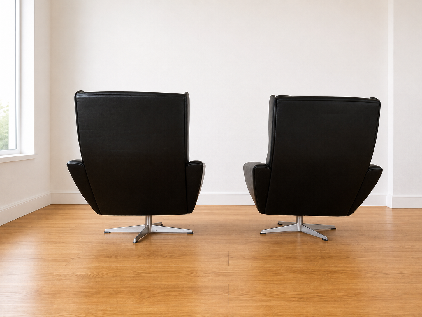 Vintage Danish Georg Thams matching black leather lounge chairs 1970s