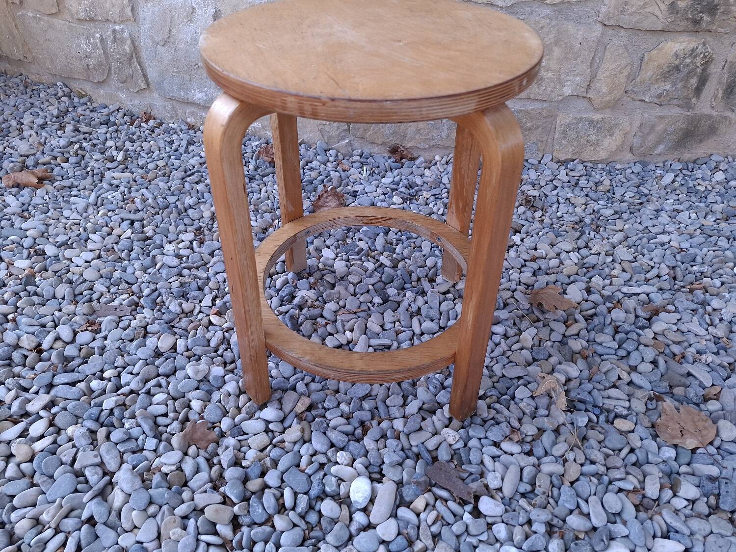 Vintage curved wooden stool