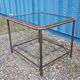 Table with an old ship porthole in brass and a metal base / 100 x 85 x 76 cm