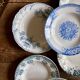 Set of 8 mismatched antique ironstone deep plates.