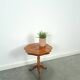 Round vintage wooden side table with inlaid veneer
