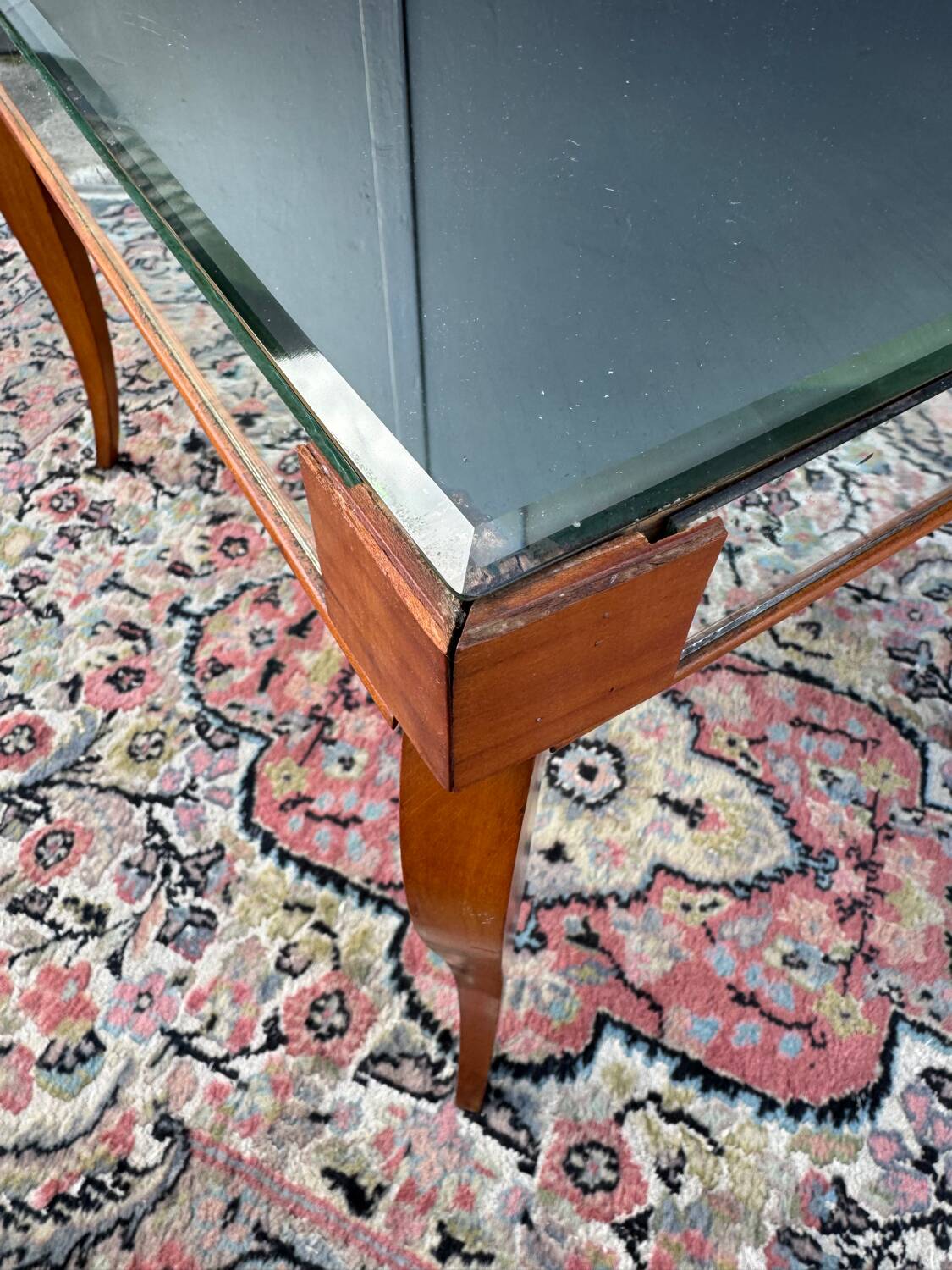 Small wooden coffee table with a mirror from the 1950s.