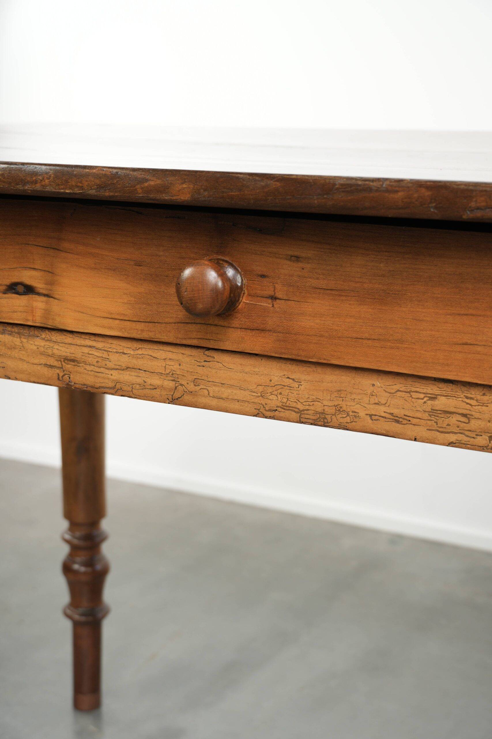 Antique French cherry wood dining table from the 19th century