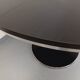 Vintage dining table in melamine with a black wood effect and chrome metal.