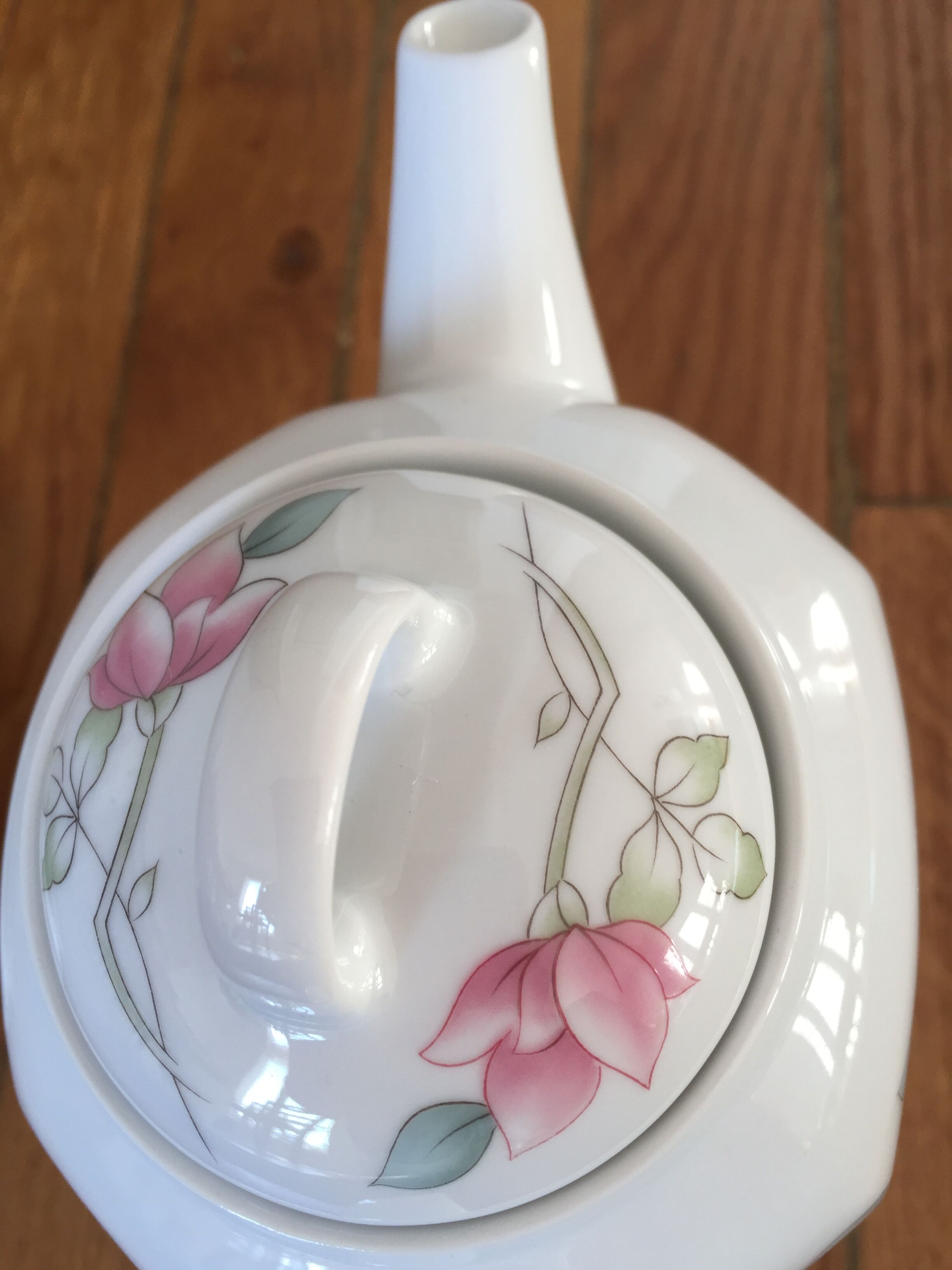 Vintage porcelain coffee or teapot with milk jug