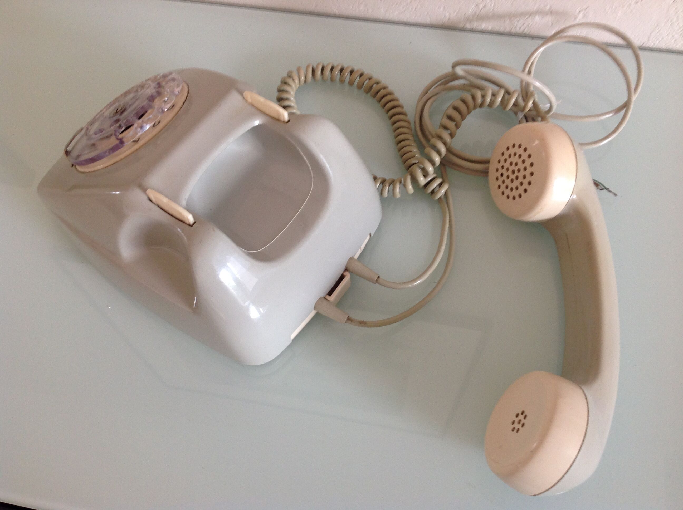 Vintage gray and beige rotary phone