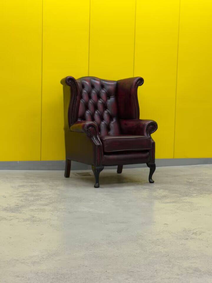 Burgundy leather chesterfield wing chair (Price is for one)